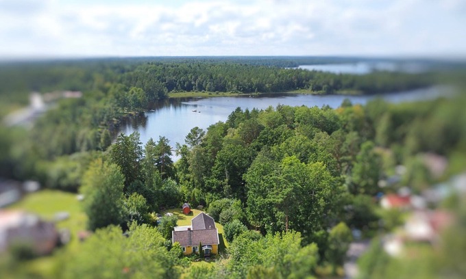 Alsterbro House | Villa Lotte - Holiday home in southern Sweden with sauna, boat & nature near the lake