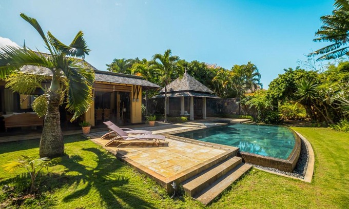 Tamarin Villa | Villa sur le golf avec piscine et jardin tropical
