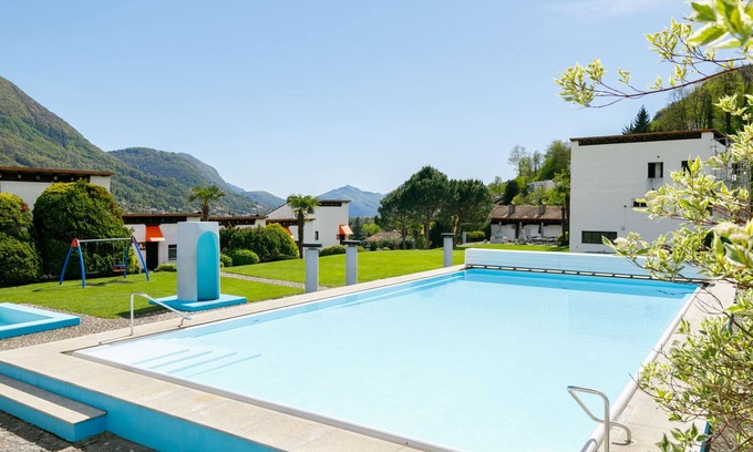 Capriasca Apartment | Villaggio Sureggio C4 mit TicinoTicket by Interhome