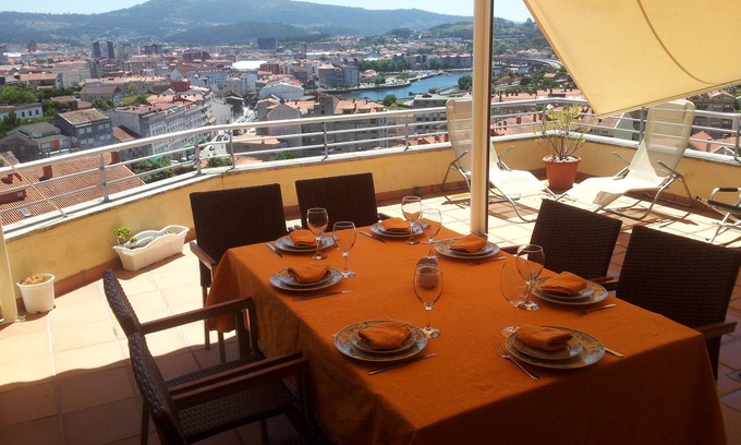 Poio Apartment | VUT-PO- 000403 Balcony Aerial view of the city. Terrace 30 m2 Ria de Pontevedra