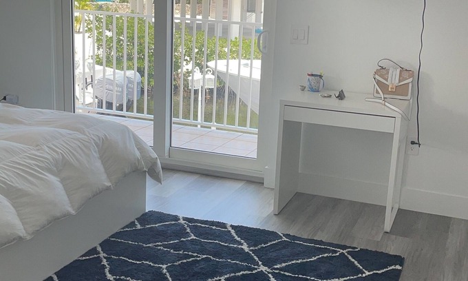 Long Key House | Water front property with bar, tennis, market place, and restaurants close by.