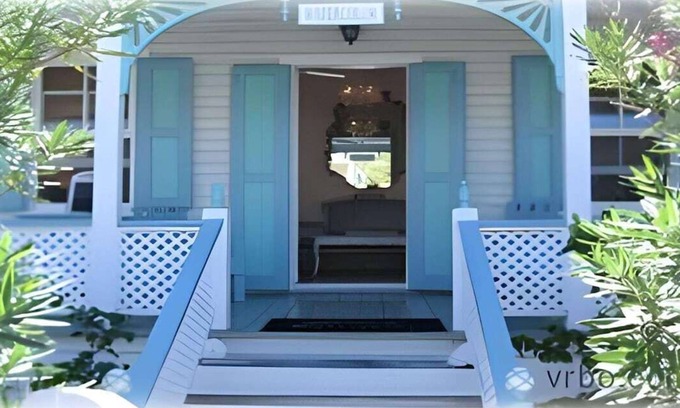 Dunmore Town Cottage | Watercolor a Charming Island Cottage. 3 Bedroom