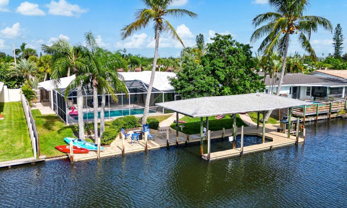 Venetian Way House | Waterfront Heated Pool w/Boat Dock & Game Room - 4bd/2ba Paradise Found