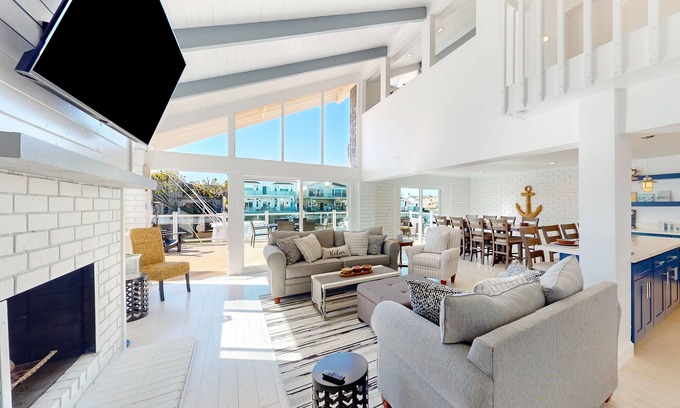 Channel Islands House | Waterfront home with kayaks, grill, Pac-Man, AC, balconies, & smart TVs