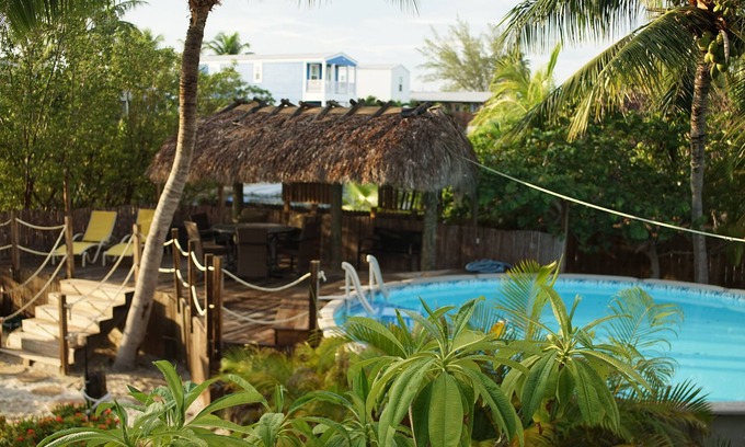 Bay Point House | Waterfront Pool Oasis: Tiki Hut, Kayaks & Family Fun!