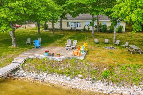 Central Lake House | Waterfront Torch Lake Cottage with Dock and Fire Pit!