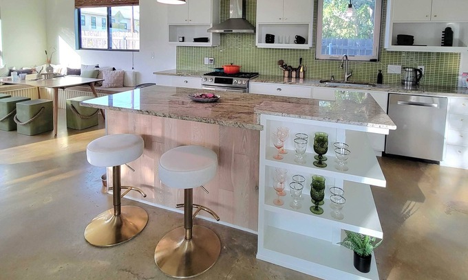 MLK House | Welcome to East Austins Cactus House! Private Stock Tank Pool + Hot Tub
