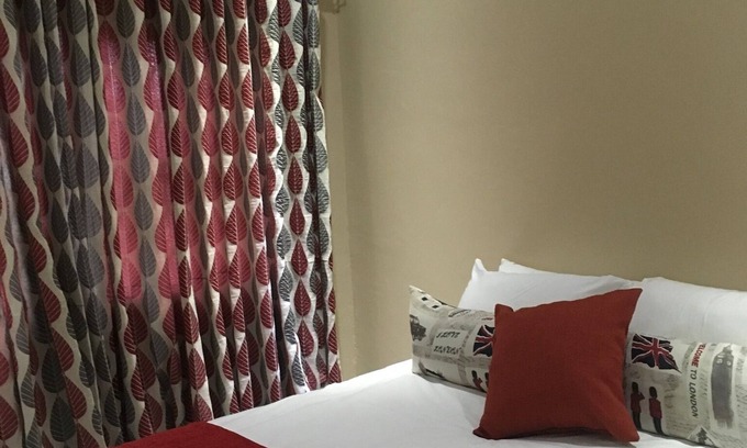 Greendale Apartment | Well secured 3 bedroom apartment, clean and neat with a beautiful garden