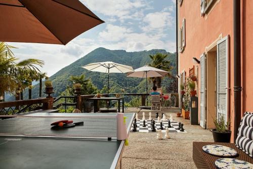 Isorno House | Wild Valley Palm Terrace in Valle Onsernone