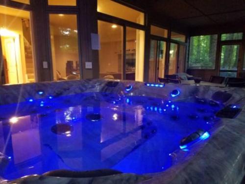 Lake Michigan Beach House | Woodshores Retreat - cozy retreat, hot tub, Lk MI