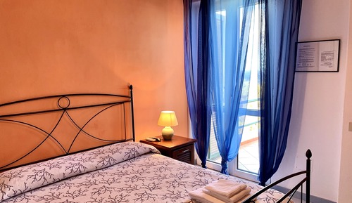 Family Quadruple Room, 2 Double Beds, Partial Sea View
