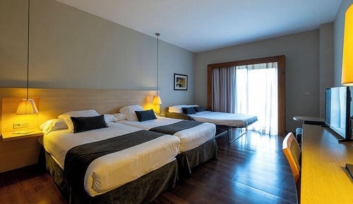 Habitación doble con sofá cama