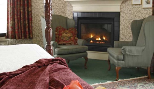 King Whirlpool Fireplace Room with Private Deck
