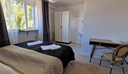 Economy Double Room, 2 Twin Beds, Shared Bathroom, Garden View