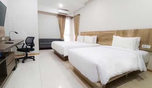 Deluxe Triple Room