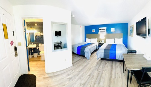 Deluxe Quadruple Room, 2 Queen Beds