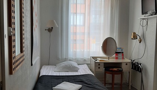 Single Room, Shared Bathroom