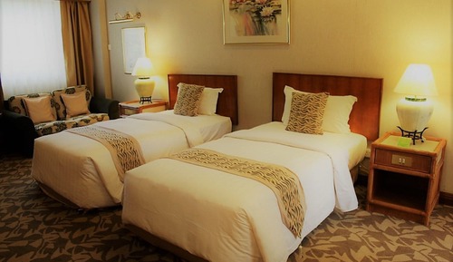 1 Bedroom Suite - 2 Single Beds