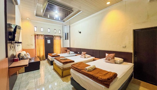 Deluxe Triple Room, Balcony, Garden View
