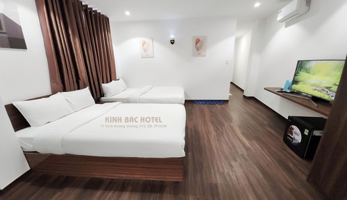 Deluxe Quadruple Room, Private Bathroom, City View