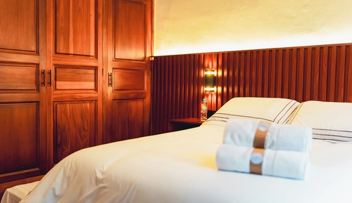 Deluxe Room, Multiple Beds, Private Bathroom, Courtyard View