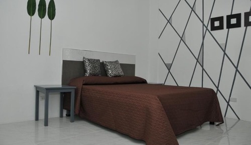 Deluxe Quadruple Room, City View