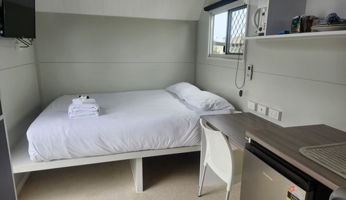 Compact Queen Caravan Room