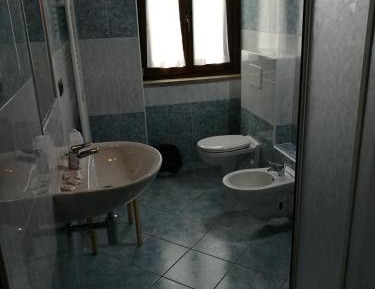 Quadruple Room with Private Bathroom