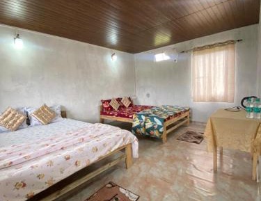 Quadruple Room with Shared Bathroom