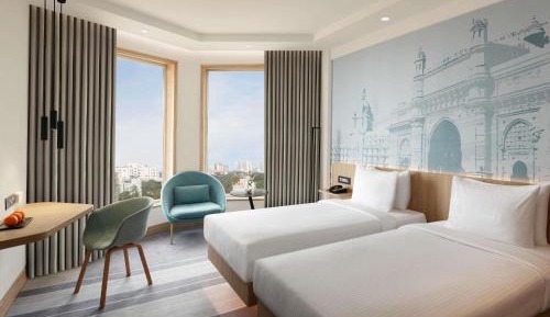 Premier Twin Bed City View Higher Floor with Complimentary Two Way Airport Transfers, Happy Hours from 6pm to 8pm IMFL Brands at Premier Lounge 