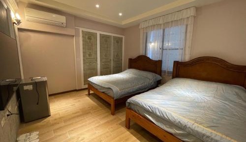 Quadruple Room with Private Bathroom