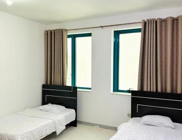 Queen Room with Shared Bathroom