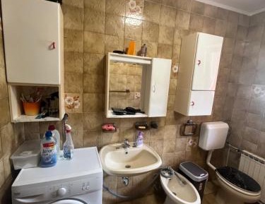 Three-Bedroom Apartment with Balcony