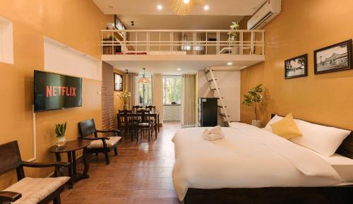 One-Bedroom Apartment with Balcony and City View