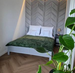 One-Bedroom Apartment with Balcony and City View