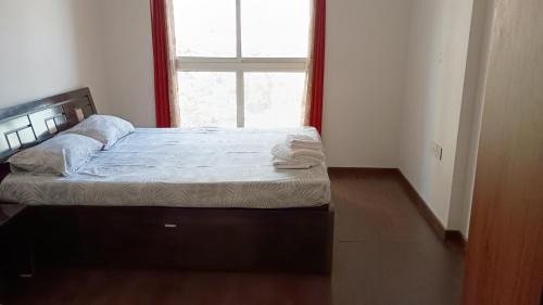 One-Bedroom Apartment with Balcony and City View