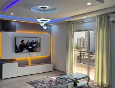 One-Bedroom Apartment with Balcony and City View