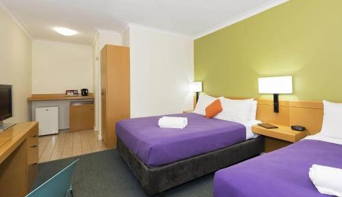 Standard Room with One Queen Bed and Two Single Beds