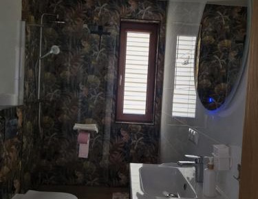 Quadruple Room with Private Bathroom