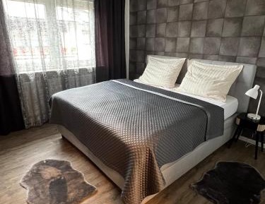 Three-Bedroom Apartment with Balcony