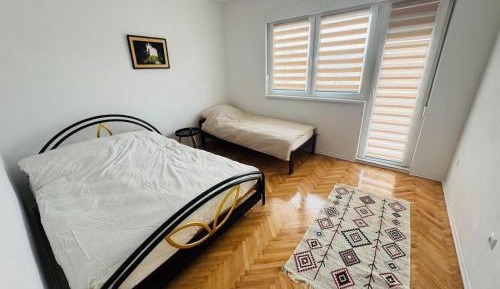 Two-Bedroom Apartment with Balcony and Terrace