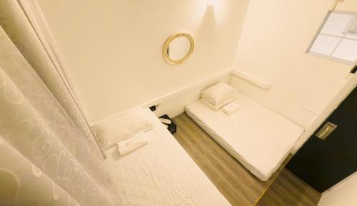 Twin Room with Shared Bathroom