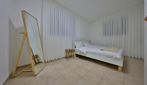 Four-Bedroom Apartment with Balcony 