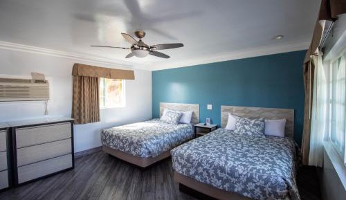 Queen Room with Two Queen Beds and Kitchen - Non-Smoking