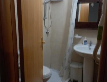Quadruple Room with Private Bathroom
