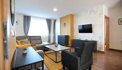 Four-Bedroom Apartment with Balcony 