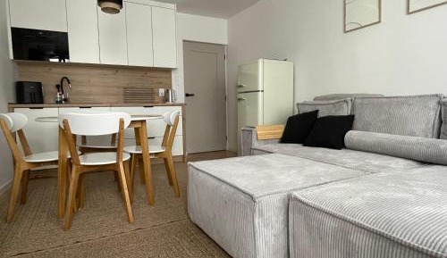 One-Bedroom Apartment with Balcony and City View