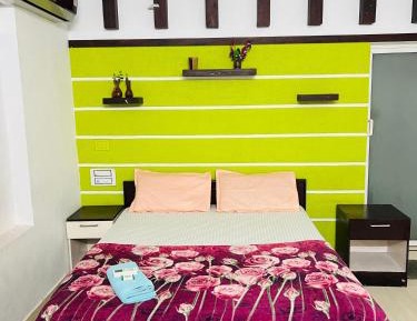 Deluxe Room (2 Adults + 1 Child)