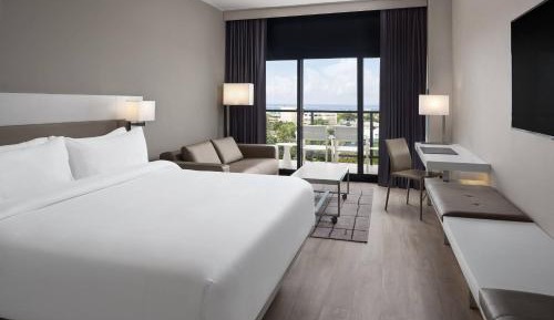 Larger Guest room, 1 King, Sofa bed, Balcony