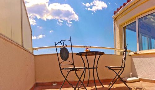 One-Bedroom Apartment with Balcony and Sea View